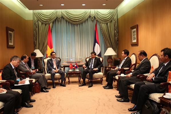 Vizepremierminister Vu Duc Dam trifft Sri Lankas Präsident, Laos’ Premier und Katars Vizepremier - ảnh 1